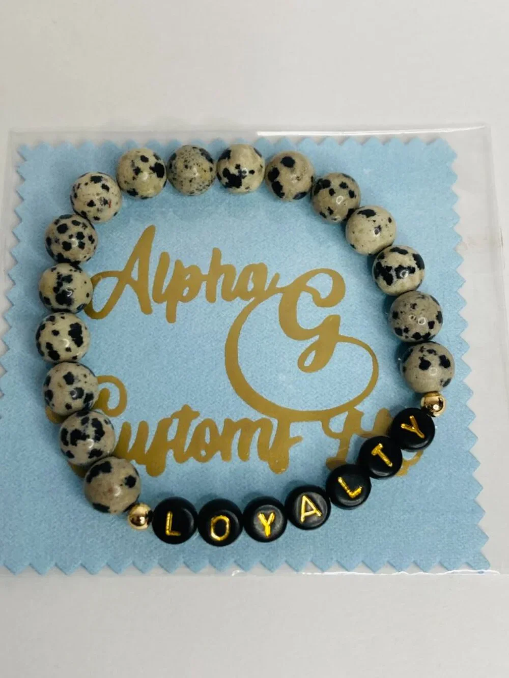 Faithful Energy – Dalmatian Jasper Bracelet with Loyalty Charm